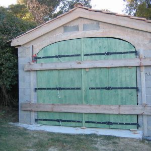 04-09 Porte de garage cintré en 3 plies épicéa 4 vantaux